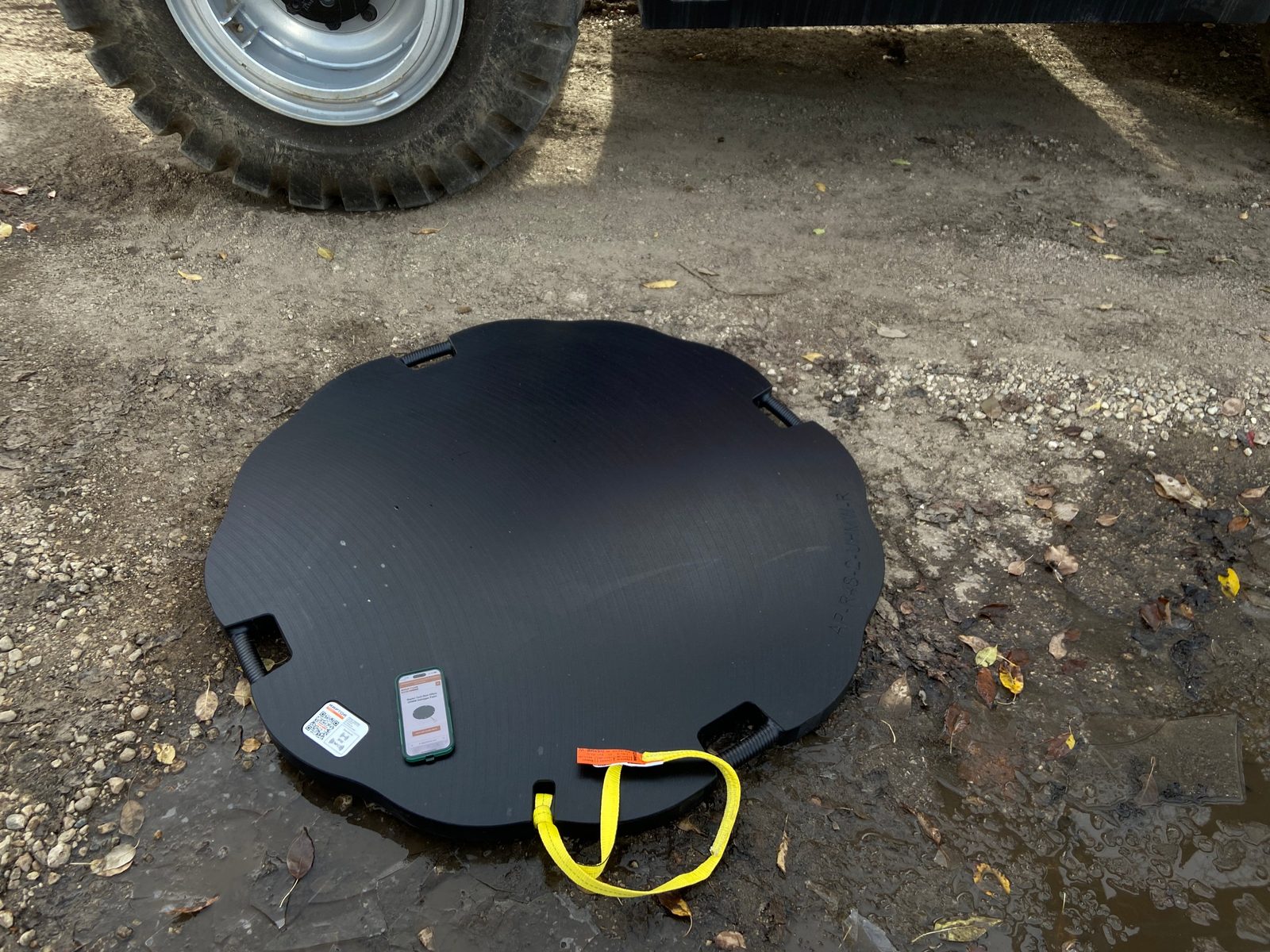 Area Plus outrigger pad with RFID and NFC tag and product data pulled up on a phone